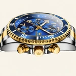 Detalhe lateral do relógio Dourado-Azul com coroa, dois botões e borda do aro