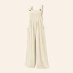 Ivory wide-leg jumpsuit with buttoned shoulder straps, gathered bodice and side pockets