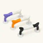 Three white ruler handles with purple, orange and black accents and clear suction cups