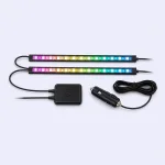Overhead view of two multicolor light strips beside a square controller and coiled power cable.
