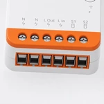 Close-up of six screw heads and six rectangular wire entries in the orange terminal strip