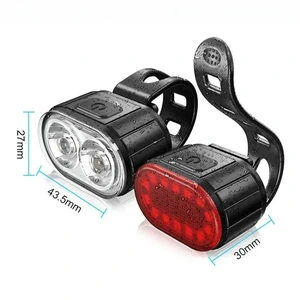 Coppia di luci anteriore bianca e posteriore rossa con gocce, fascette e quote di 27, 43,5 e 30 mm.