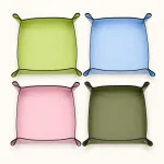 Tapis de rempotage vert clair, bleu, rose et vert foncé, avec coins relevés et boutons-pression