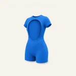 Blue short-sleeve romper showing its large oval back opening and fitted shorts.
