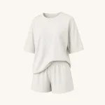 Off-white ribbed top and shorts set with a round neckline, loose sleeves and gathered waistband