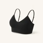 Angled view of a black bralette showing shaped cups, slim straps and the side band