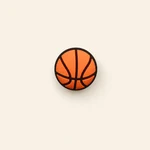 Orange basketball charm photographed from above