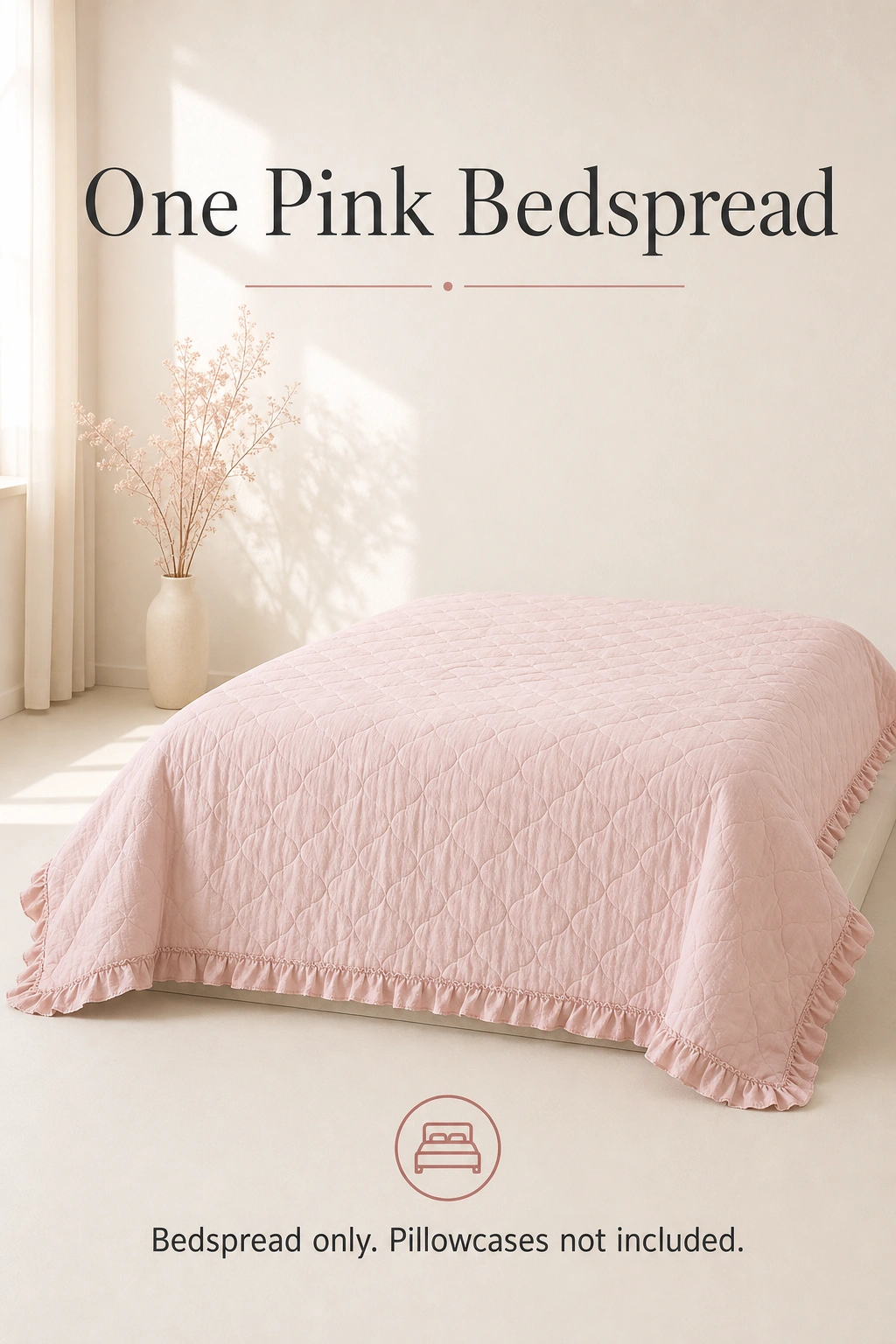 Uma colcha rosa matelassada, sem fronhas