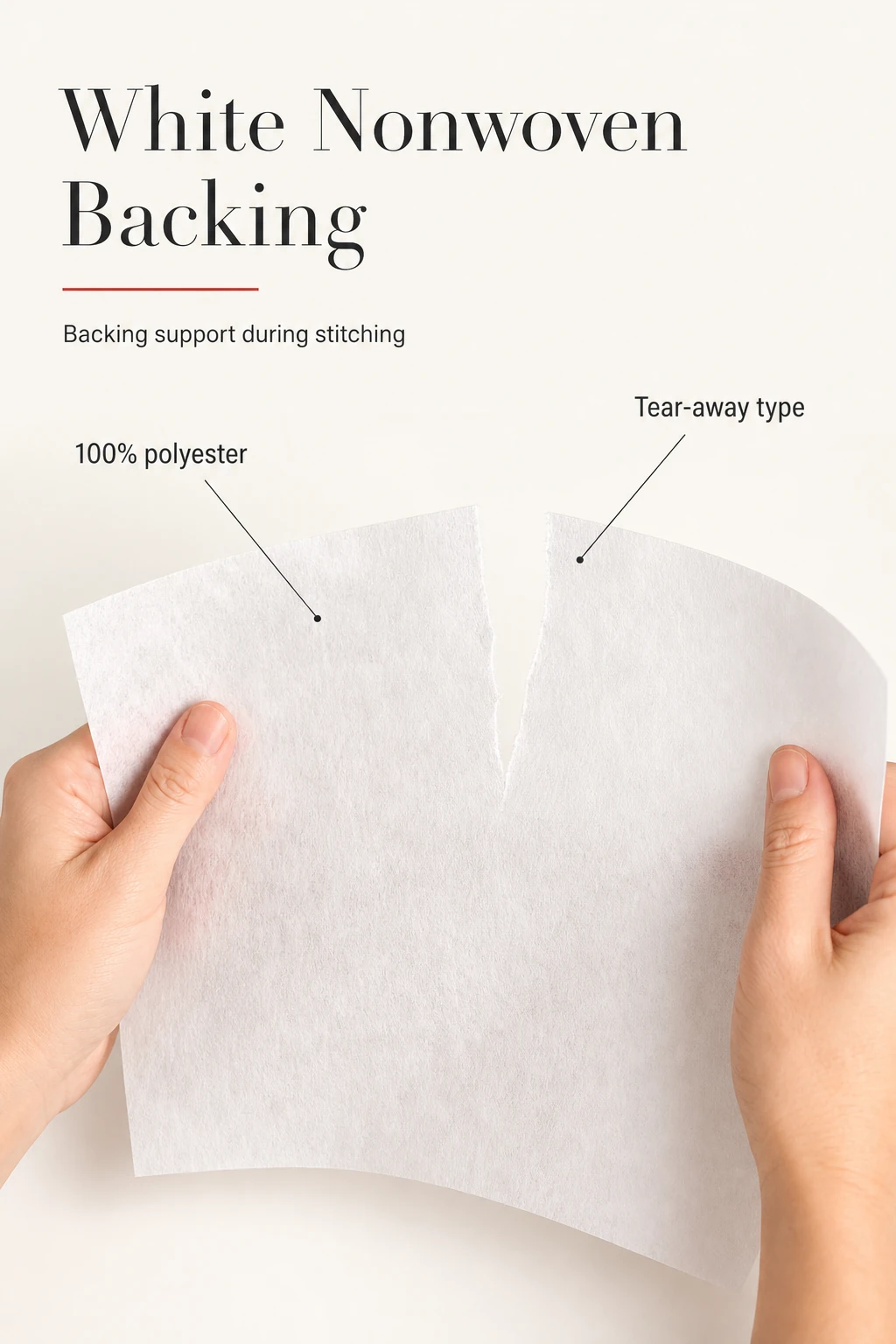 Two hands tearing a thin white nonwoven sheet, with polyester and tear-away labels