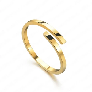 Gold-color blank open ring with offset rectangular ends on white