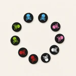 Ten skull-print thumbstick caps arranged in a circle, two in each of five colors