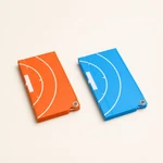 Orange and blue landing pads folded separately into compact rectangles