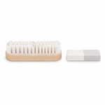 Side view of the suede brush and two-tone eraser arranged separately on a white background