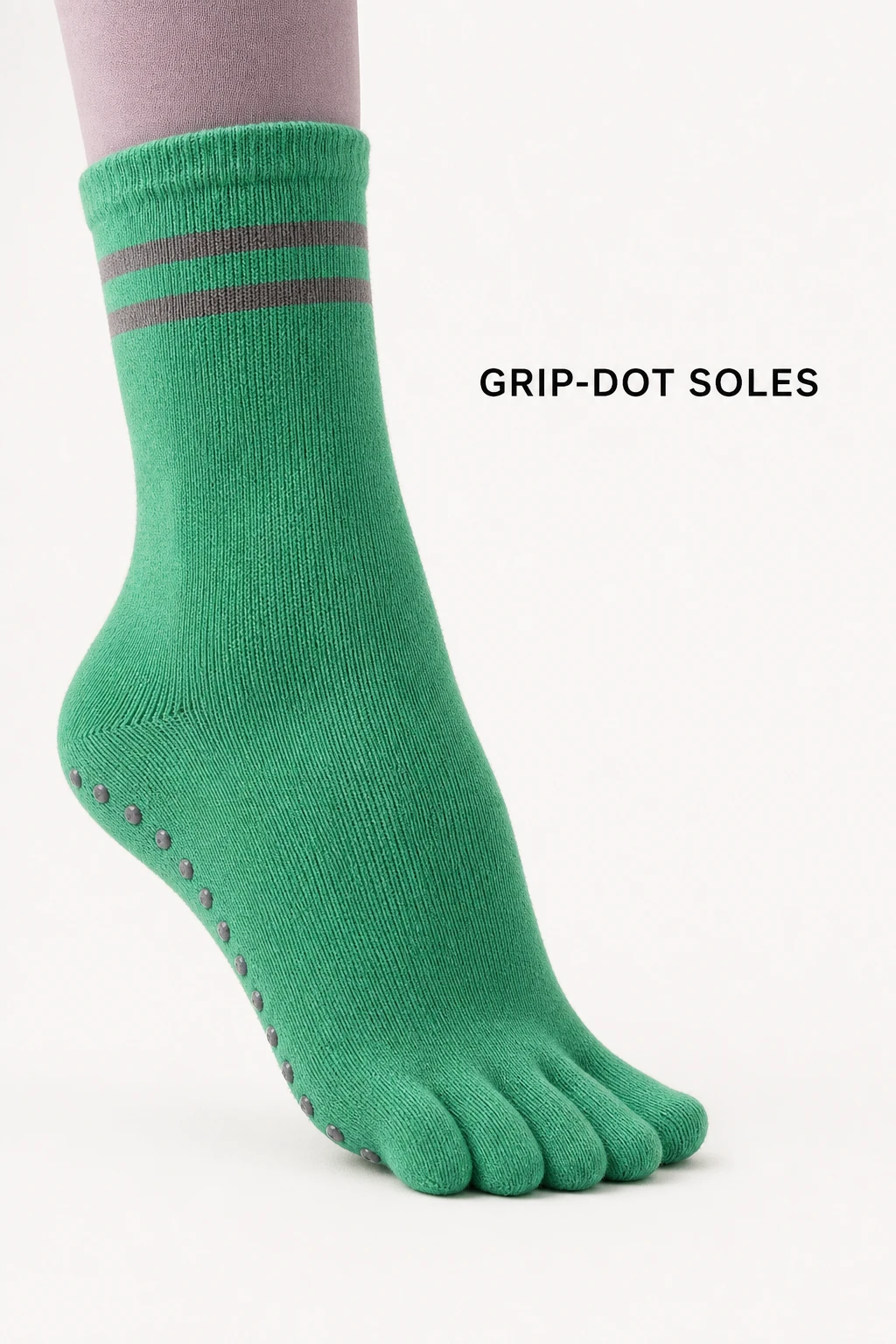 Green five-toe sock sole showing the grip-dot pattern