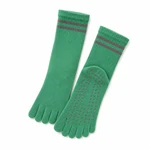 Green pair of five-toe striped crew socks with one grip-dot sole angled outward