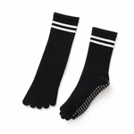 Black five-toe socks laid as a pair with striped cuffs and sole dots