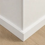 Several separate white PVC trim segments arranged with visible gaps between the ends.