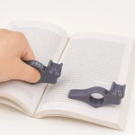 Dark-gray Tabby holder on a thumb over a book, Classic beside it.