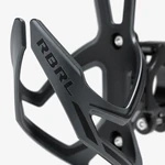 Macro close-up of the RBRL-marked cage arm and composite surface