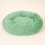 Couchage circulaire vert menthe avec zone de repos creuse