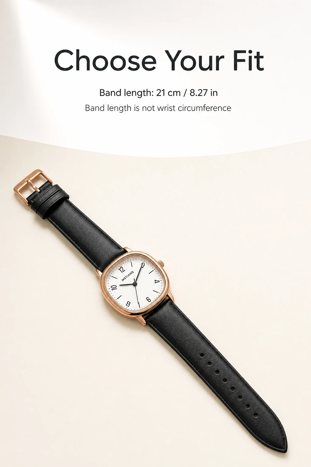 Black watch laid open beside the 21 cm band-length explanation