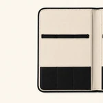 Close-up of one interior panel showing a horizontal band and three lower pockets