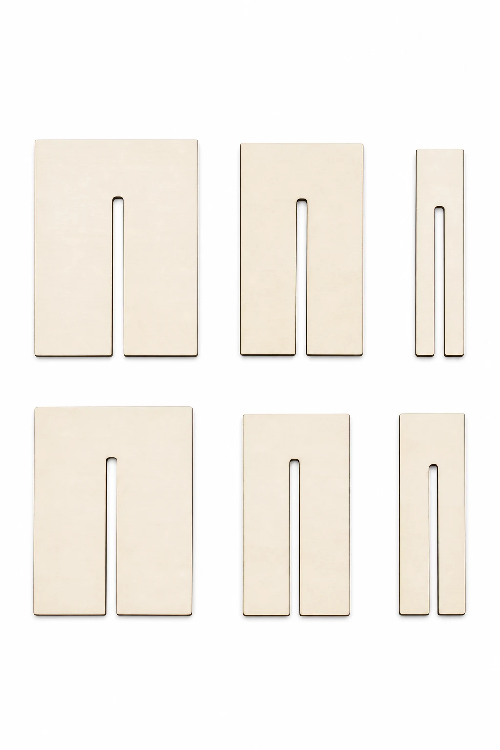 Six wooden bow-making boards arranged in two rows