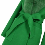 Close-up of green coat tie belt and patch pocket